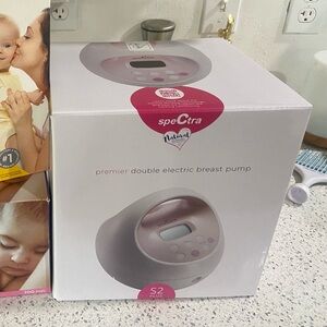 Medela Electric Breast Pump with Pink and White Design